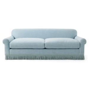 Light blue Serena and Lily Sofa with rounded arms, two seat cushions, and decorative fringe along the bottom edge.