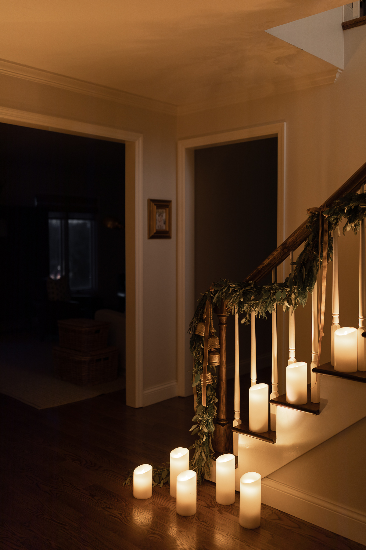 A staircase with LED candles on it.
