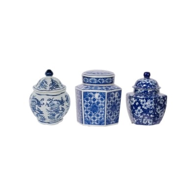 Three blue and white jars with lids.