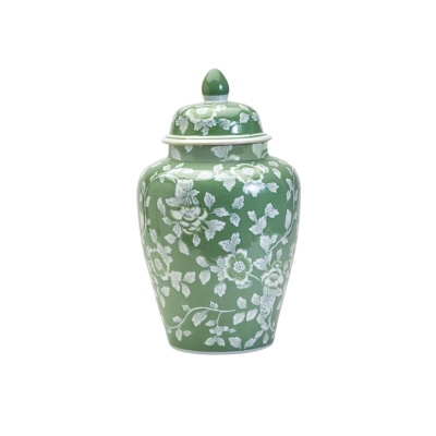 A green and white ceramic jar with a lid.