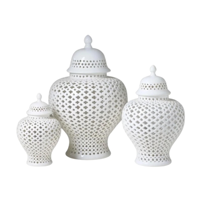 Three white porcelain urns with lids on a white background.