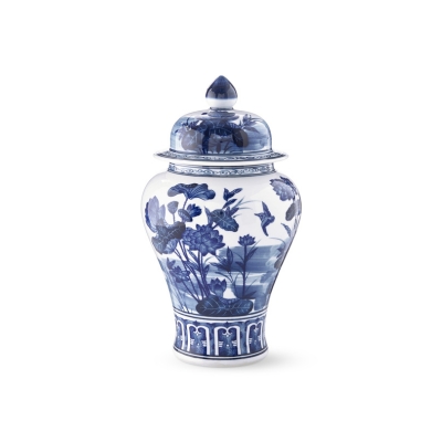 A blue and white ginger jar with a floral design.