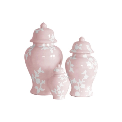 Three pink urns with floral designs on them.
