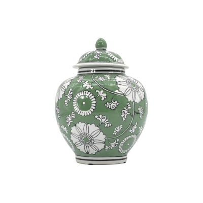 A green and white ceramic urn with floral designs.