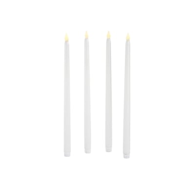 Three flameless candles on a white surface.