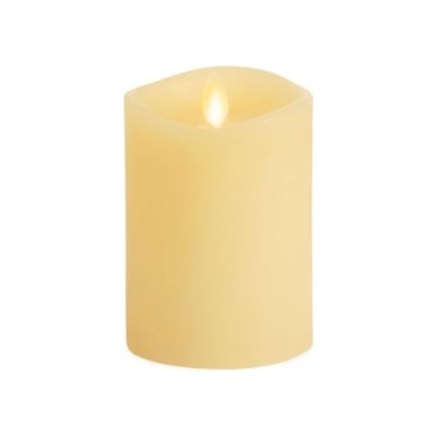 A yellow LED candle on a white background.