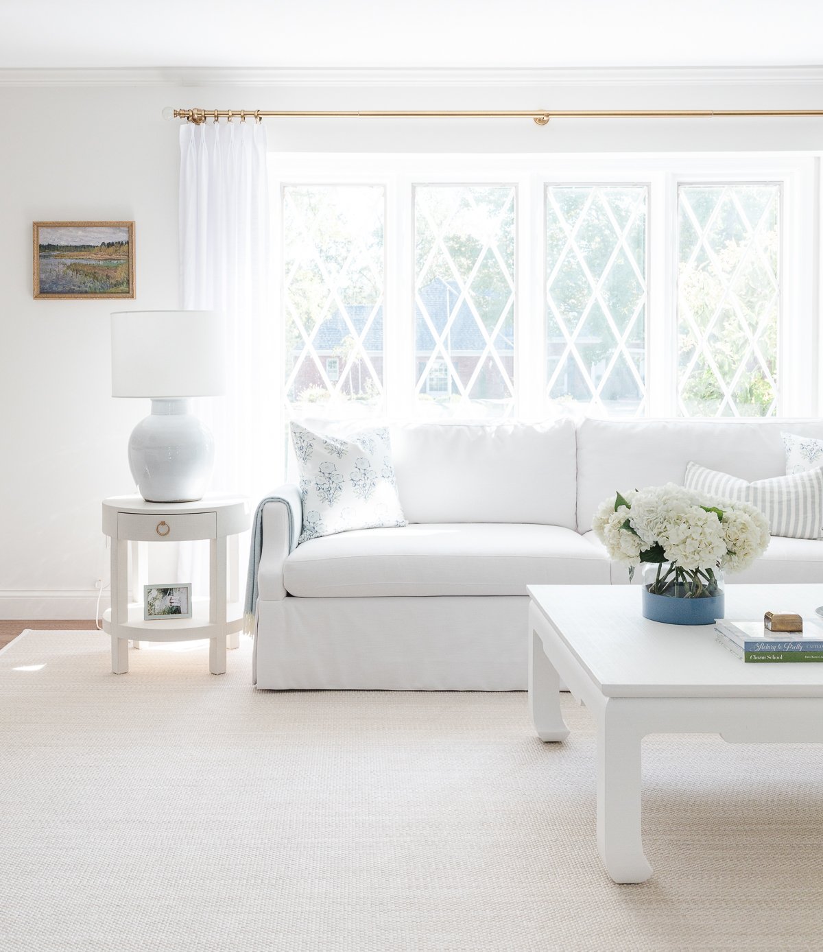 A white Serena and Lily sofa in a living room.