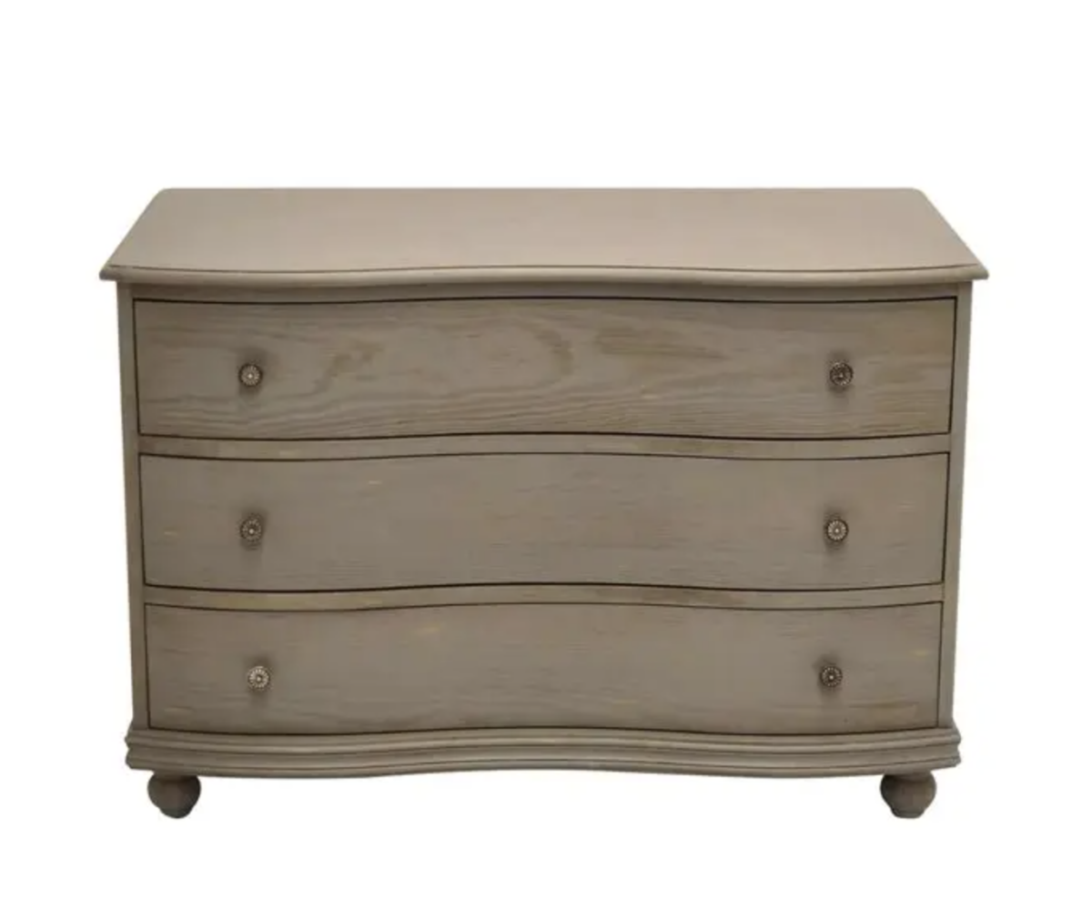 A curved grey dresser on a white background.