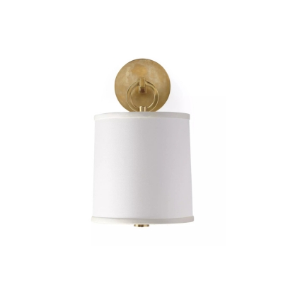 A bathroom sconce with a white drum shade.