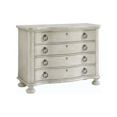A white dresser with black handles, featuring curved design elements.