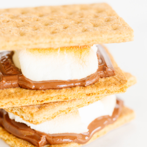 A stack of oven-baked s'mores made with graham crackers, chocolate, and marshmallows.