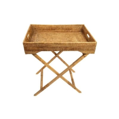 A rectangular woven basket tray placed on a foldable wooden stand offers a chic pottery barn look for less.