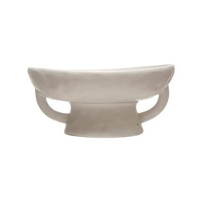 A white bowl with a handle on a white background, perfect for achieving the sleek and minimalist RH Look for Less.