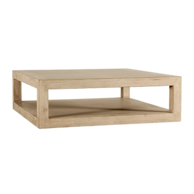 A square wooden coffee table with a RH Look for Less.