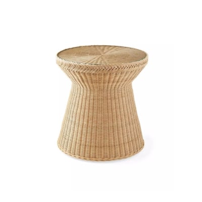 A wicker side table designed as a serena and lily dupe on a white background.