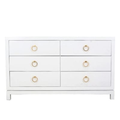 A white dresser with gold ring handles, perfect for those seeking Serena and Lily dupes.