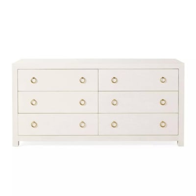 A white dresser with brass knobs, perfect for serena and lily dupes enthusiasts.