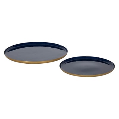 Two blue and gold rimmed plates on a white background, resembling Serena and Lily dupes.