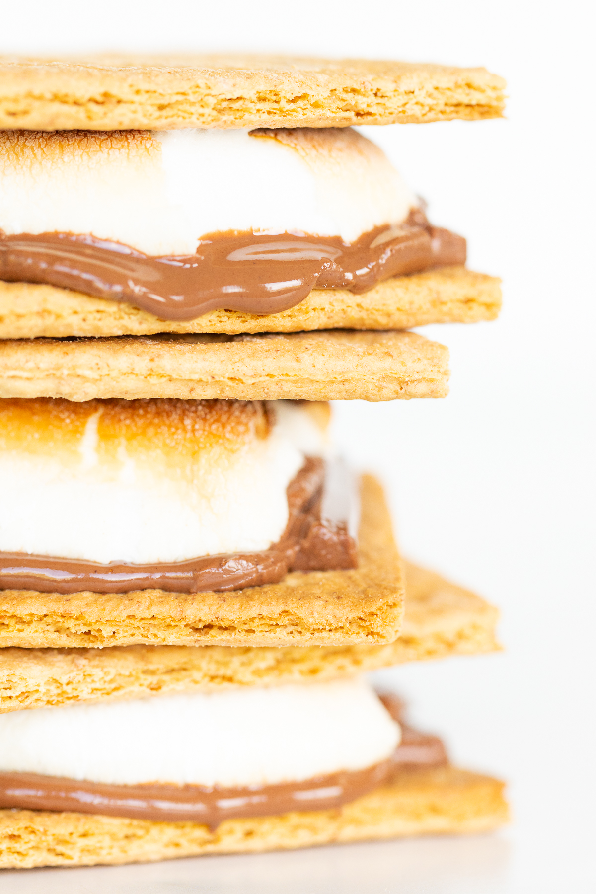 A stack of oven-baked s'mores with chocolate and marshmallows.