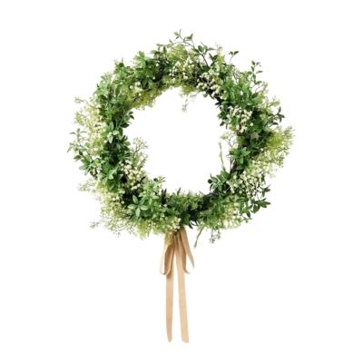 A front door wreath with greenery and ribbon on a white background.
