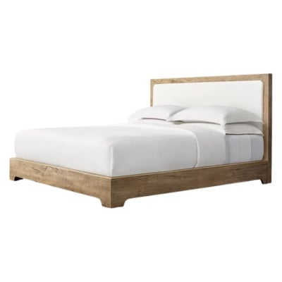 A wooden bed with white sheets and a RH Look for Less wooden headboard.