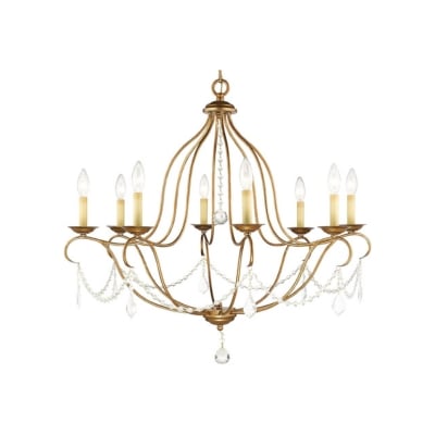 An exquisite gold chandelier adorned with sparkling crystals, providing an opulent Arhaus aesthetic at a fraction of the cost.
