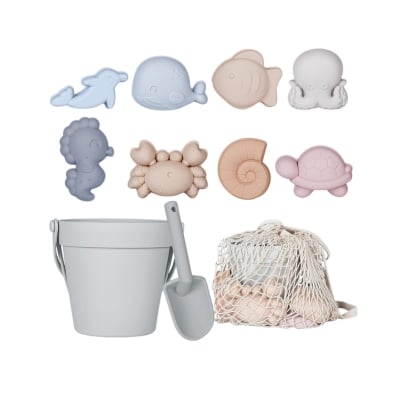 A bucket filled with sea animals and sand, perfect for Easter basket fillers.