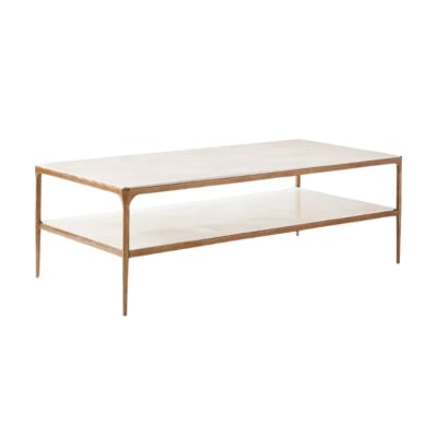 Spruce up your music room with a stylish marble top coffee table featuring elegant brass legs.