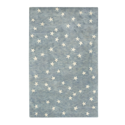 A blue rug with white stars on it.