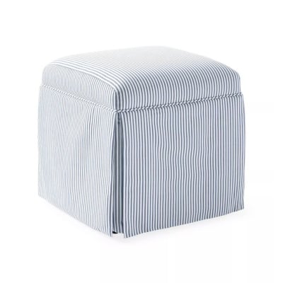 A blue and white striped ottoman on a white background offers the Serena and Lily look for less.
