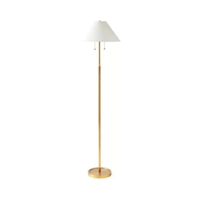 Get the Serena and Lily look for less with this gold floor lamp featuring a white shade.