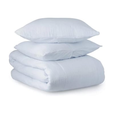Three white pillows stacked on top of each other, offering a Serena and Lily look for less.