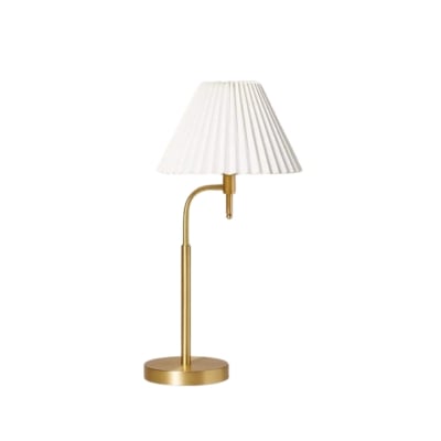 A gold table lamp with a white shade offers a similar serena and lily look for less.