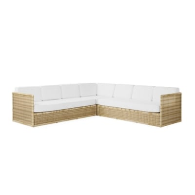 A white wicker sectional sofa offers a Serena and Lily look for less on a white background.