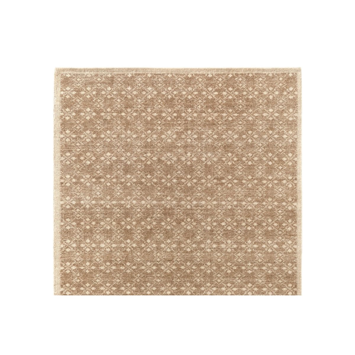 A rectangular beige rug with a subtle floral pattern offers a chic Pottery Barn look for less.