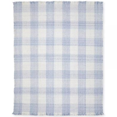 Light blue and white checkered fabric with fringed edges, perfect for crafting or upholstery projects. Refer to our rug size guide to ensure a perfect fit for your space.