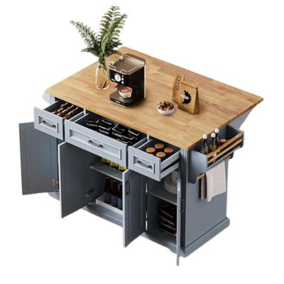 A kitchen island with a wooden countertop serves as the perfect craft space, equipped not just for culinary delights but creative endeavors. Featuring an espresso machine, bread box, ferns, and open cabinets displaying spices and bottles; it even sports a handy towel rack on the side.