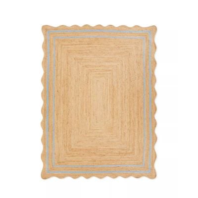 This Serena and Lily look for less rectangular rug boasts wavy edges, a light brown hue, and elegant blue double border lines.