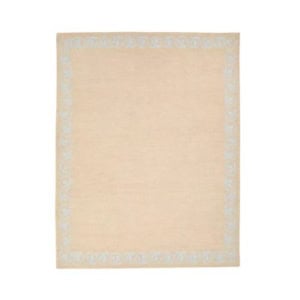 Beige rectangular area rug with a subtle light blue decorative border pattern around the edges—consult our rug size guide to find the perfect fit for your space.