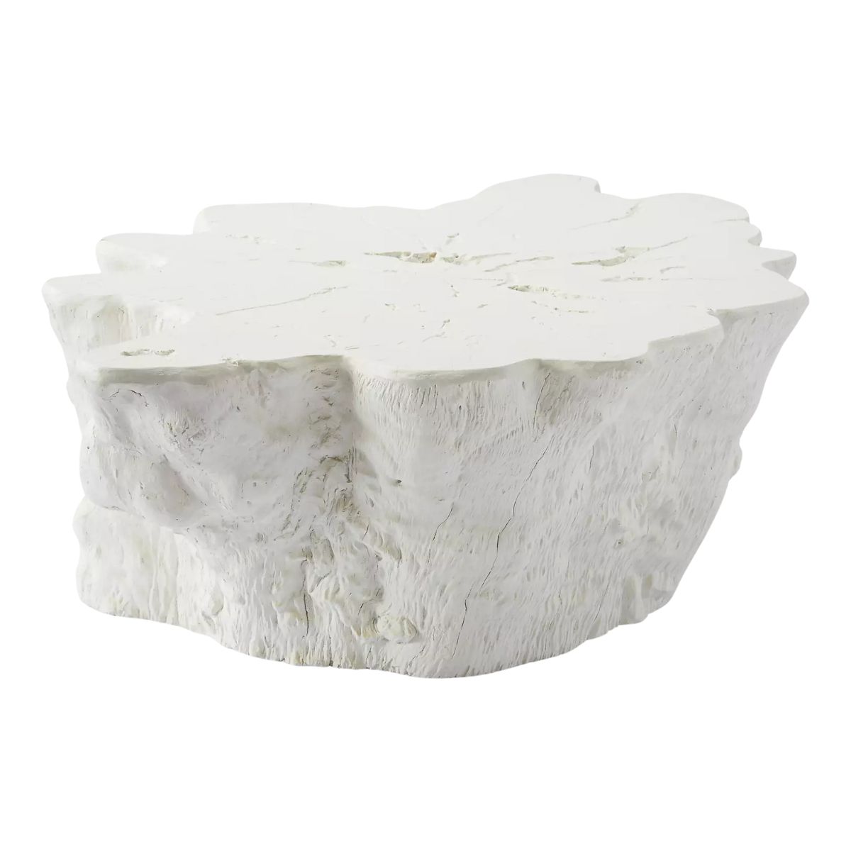 A white, irregularly shaped table with a textured surface resembling a tree stump or cross-section of a log, offering the coveted Serena and Lily look for less.