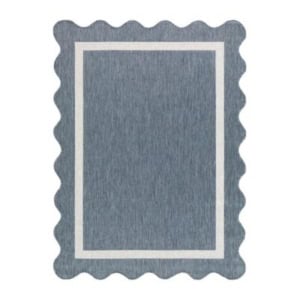 Rectangular blue rug with a white border and wavy, scalloped edges—refer to our rug size guide to find the perfect fit for your space.