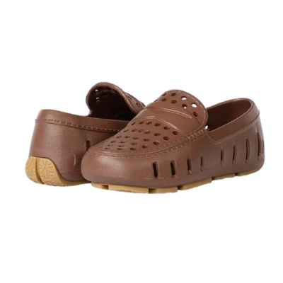 A pair of brown slip-on shoes with ventilation holes and tan rubber soles, displayed on a white background—perfect as unique Easter basket fillers.