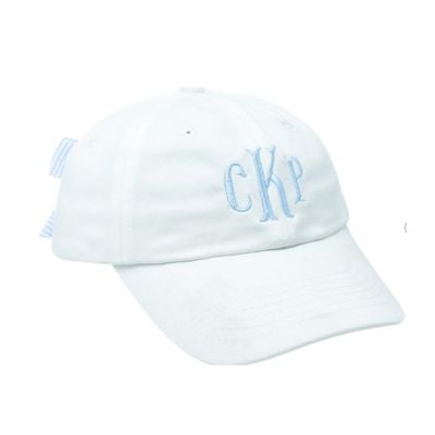 A white baseball cap featuring light blue embroidered initials