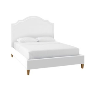A white bed with a curved headboard, white bedding, two pillows, and wooden legs offers a chic serena and lily look for less, shown against a plain background.