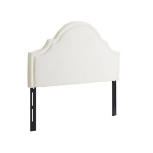 A white, upholstered headboard with a curved top and two black metal mounting legs offers a Serena and Lily look for less.