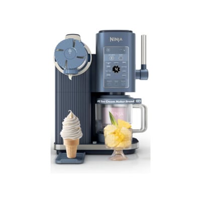 Ninja Creami ice cream maker with a soft serve cone and a glass bowl of pineapple ice cream.