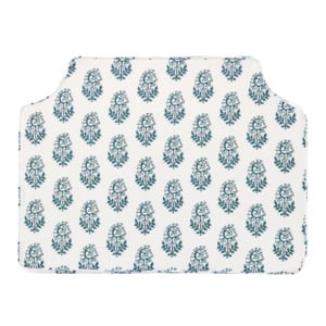 Rectangular white placemat with rounded corners, featuring a repeating blue floral pattern in evenly spaced rows.
