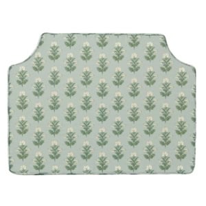 A rectangular mat with rounded corners features a repeating pattern of white flowers and green leaves on a light blue-green background.