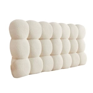 Rectangular, tufted, cream-colored upholstered headboard with a plush, rounded, grid-like pattern.