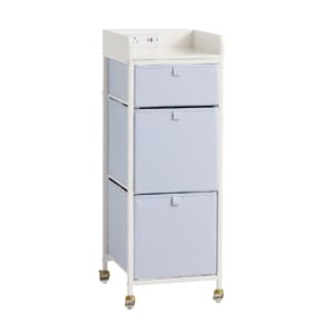 A white rolling storage cart with three light blue fabric drawers, a raised top tray, and built-in power outlets on the back panel.